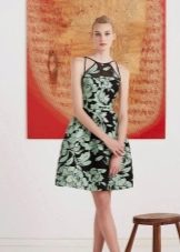Black evening dress with green print