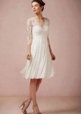 Short wedding dress with a flared skirt
