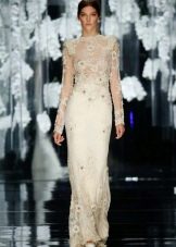Lace wedding dress with fishnet flowers from Yolan Cris 2016