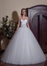 Lush wedding dress with drapery on a corset