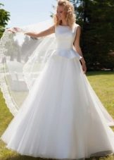 Wedding dress with a peplum from Oksana Mukha