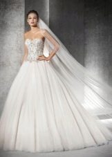 Lush wedding dress with rhinestones on a corset