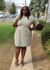 Sheath dress of a simple cut for overweight with an apple figure