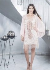 Short lace white dress with sleeves