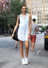 Denim shirt dress with sneakers and tote bag