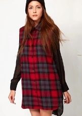 Combination shirt dress in plaid front and solid black in back, with black chiffon sleeves