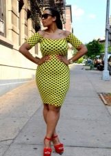 Yellow dress with black polka dots with red sandals