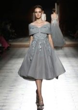 Dress with lowered sleeves in the style of dandies