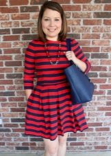 Blue bag for a dress with red and blue stripes