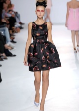 Short black dress with a bell skirt