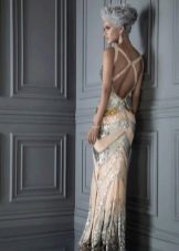 Floor-length dress with a deep cut on the back