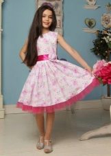 Elegant dress for a girl of 8-9 years old with a print