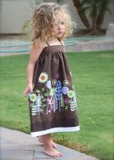 Elegant dress-saraf with a floral print for a girl