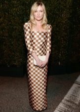 Bag for a dress in a cage on the floor