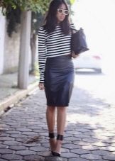 Below the knee plain pencil skirt paired with striped hem