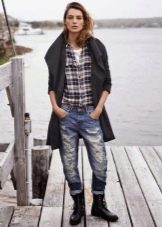 With ripped jeans