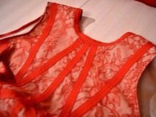 The result of processing the bodice of an evening dress with a trim