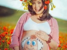 Bodypainting on the belly of a pregnant woman - child Alenka