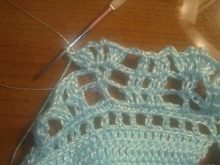 Knitting a skirt according to the pattern for a dress for a girl under one year old