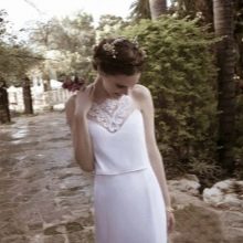 Trim the bodice of a wedding dress with lace elements