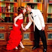 Image of the bride and groom in a red wedding