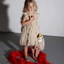 Elegant dress for a girl of 4-5 years old with flounces