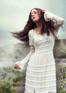 Close-up boho wedding dress made of dense lace