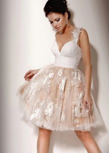 Short wedding dress with a fluffy skirt and a floral pattern