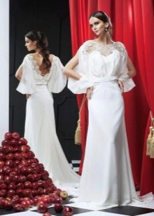 Robe de mariée à manches avec empiècements ajourés