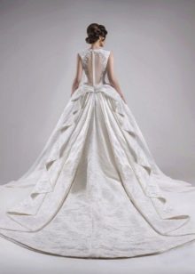 Lush wedding dress with a decorated train