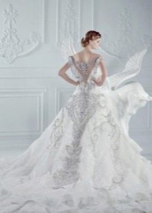 Wedding dress with a wide train of rhinestones