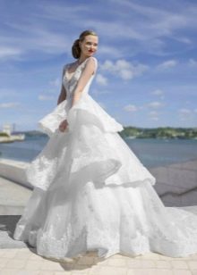 Lush wedding dress with cascading skirt