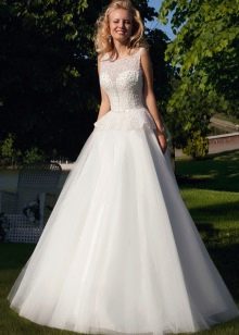 Lush wedding dress with peplum