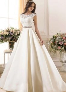 Lush wedding dress with a belt of stones