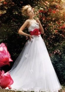 White wedding dress with red sash