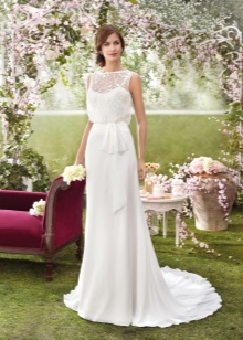 Wedding dress by Fara Sposa with a train