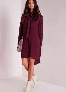 Eggplant dress in combination with light boots