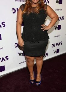 Black dress with a peplum for the plump