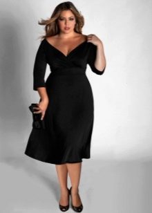 Black dress for plump with an open neckline