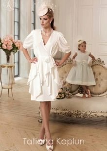 Short wedding dress by Tatyana Kaplun from the Lady of quality collection with ruffles