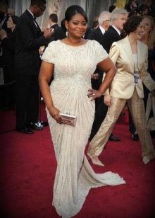 The correct cut and type of dress that hides the belly
