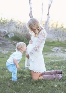 White dress for a pregnant photo shoot - son kissing tummy