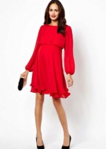 Red dress with long sleeves and a loose fit skirt for pregnant women