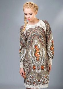Dress in Russian style with patterns and lace at the hem