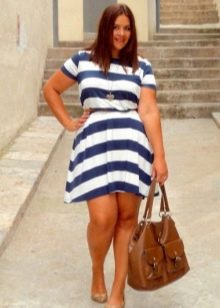 Striped a-line dress on a strap for obese women in combination with a brown bag