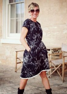 Black staple dress with small floral print midi length