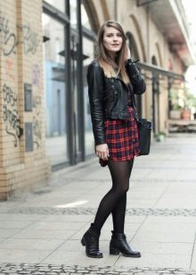 Pairing a check shirt dress with a black leather jacket