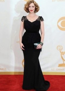 Long black dress with peplum and wing sleeves