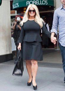 Black dress with a peplum for the plump