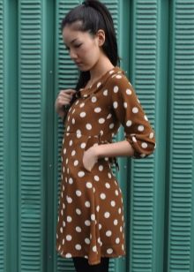 Brown dress with white peas with three-quarter sleeves